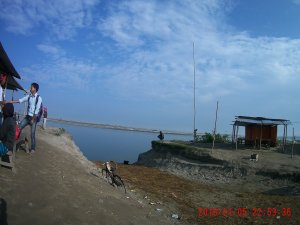 People waiting for ferry Dunaguri Ghat Majuli