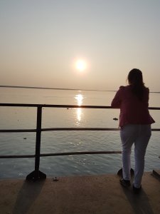 Watching sunset at kalambari ghat Watching sunset from the deck of a ferry at kalambari ghat in Majuli