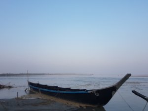 Boat and Blue Brahmaputra River Majuli