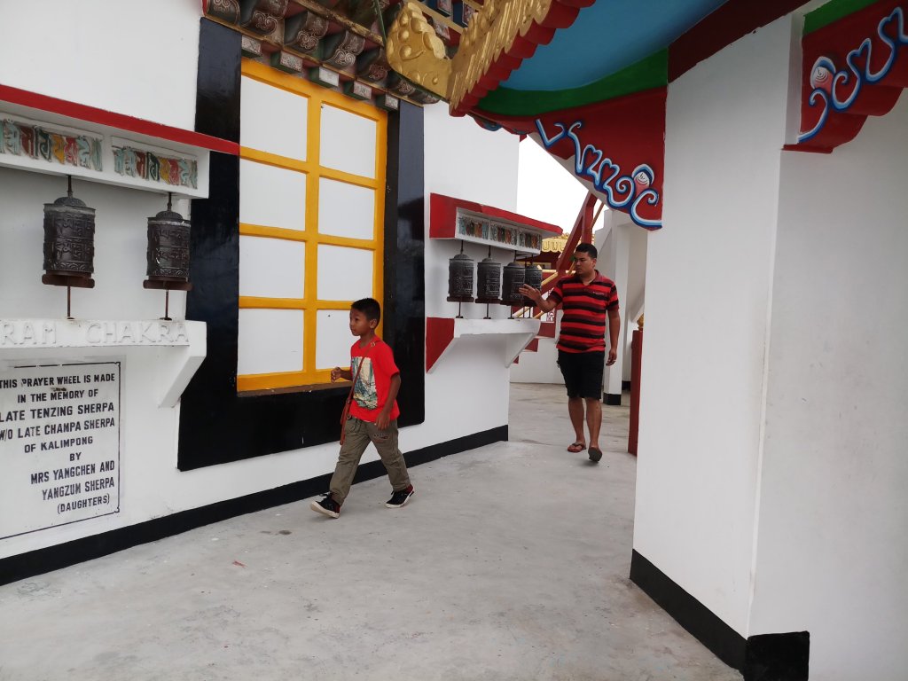 Kid walking around the Durpin Monastery in Kalimpong