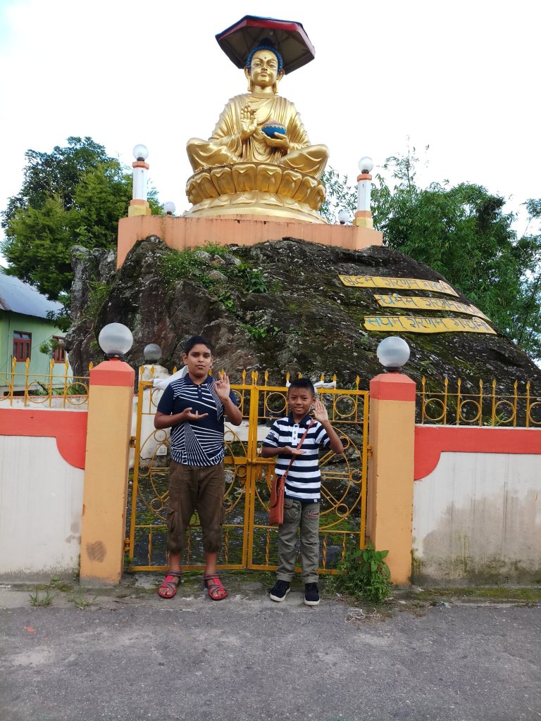Pics of kids with Buddha Statue at Delo Hill